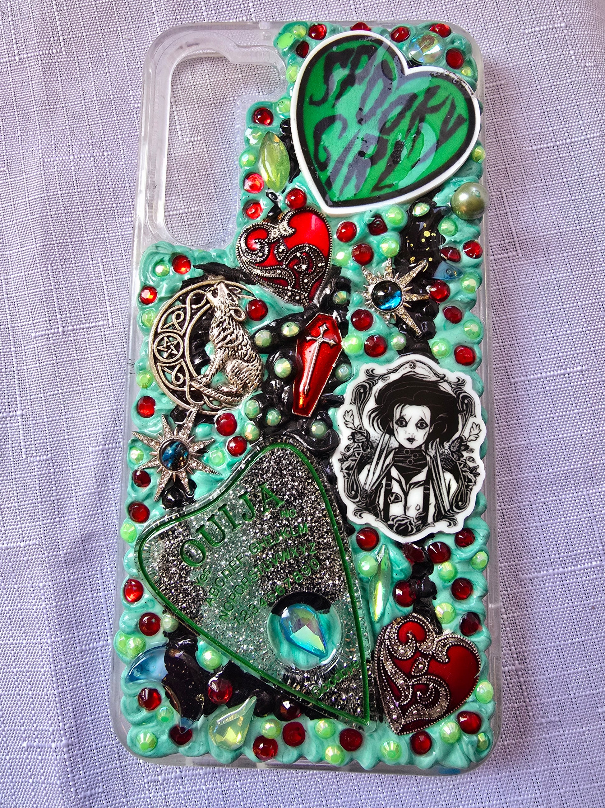 Handmade horror and witchy-themed Samsung S23 Plus phone case in green, red, and black