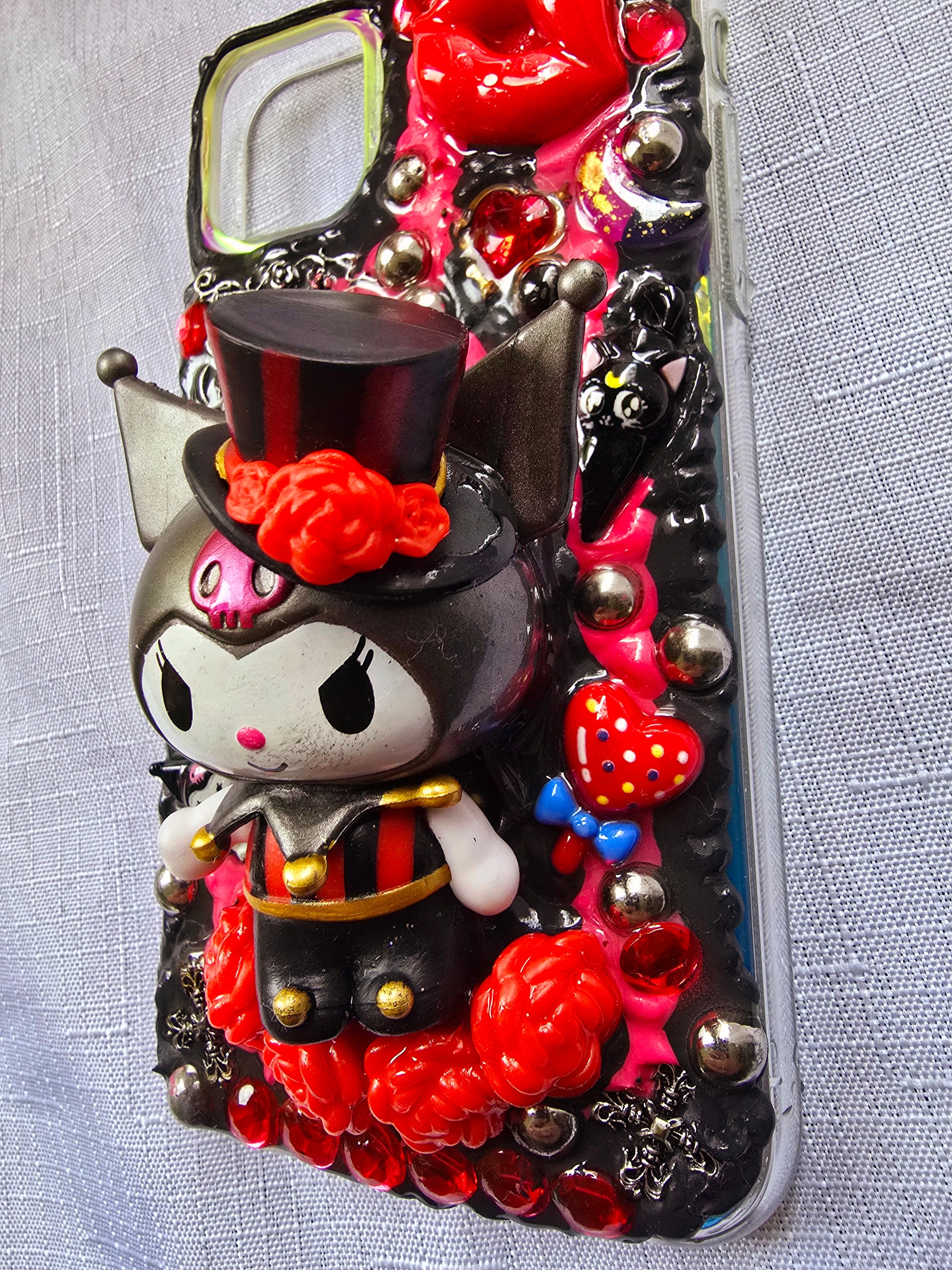 Handmade iPhone 11 phone case inspired by Kuromi in red and black colors – cute, edgy, and perfect for Sanrio fans.