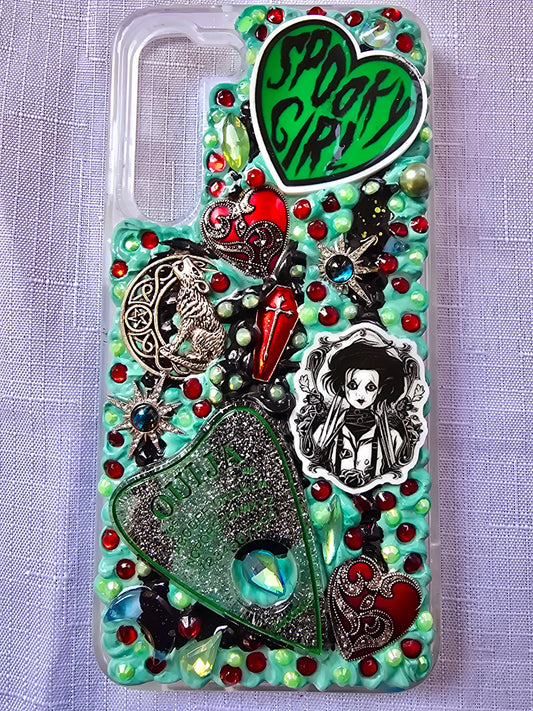 Handmade horror and witchy-themed Samsung S23 Plus phone case in green, red, and black