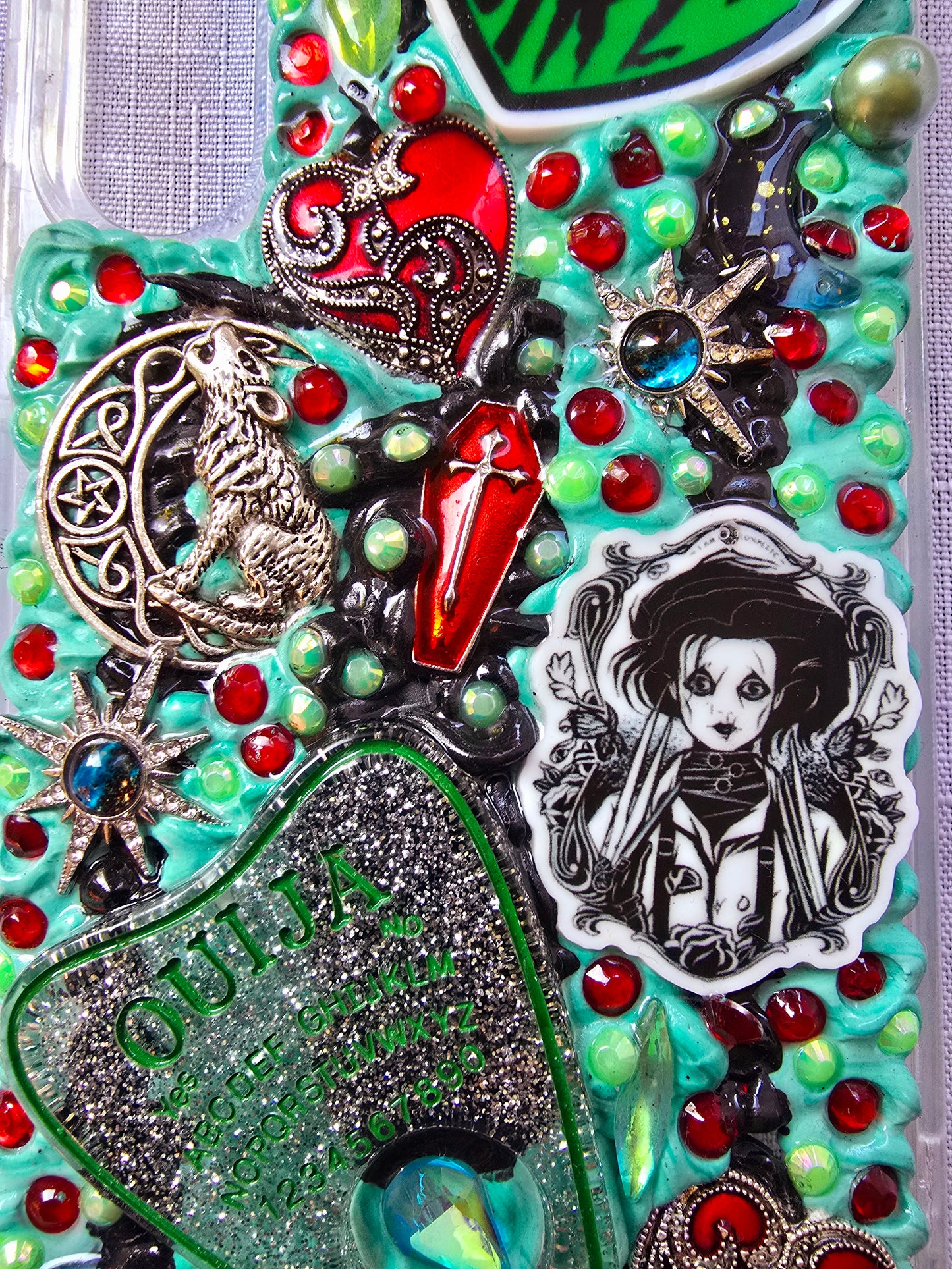Handmade horror and witchy-themed Samsung S23 Plus phone case in green, red, and black
