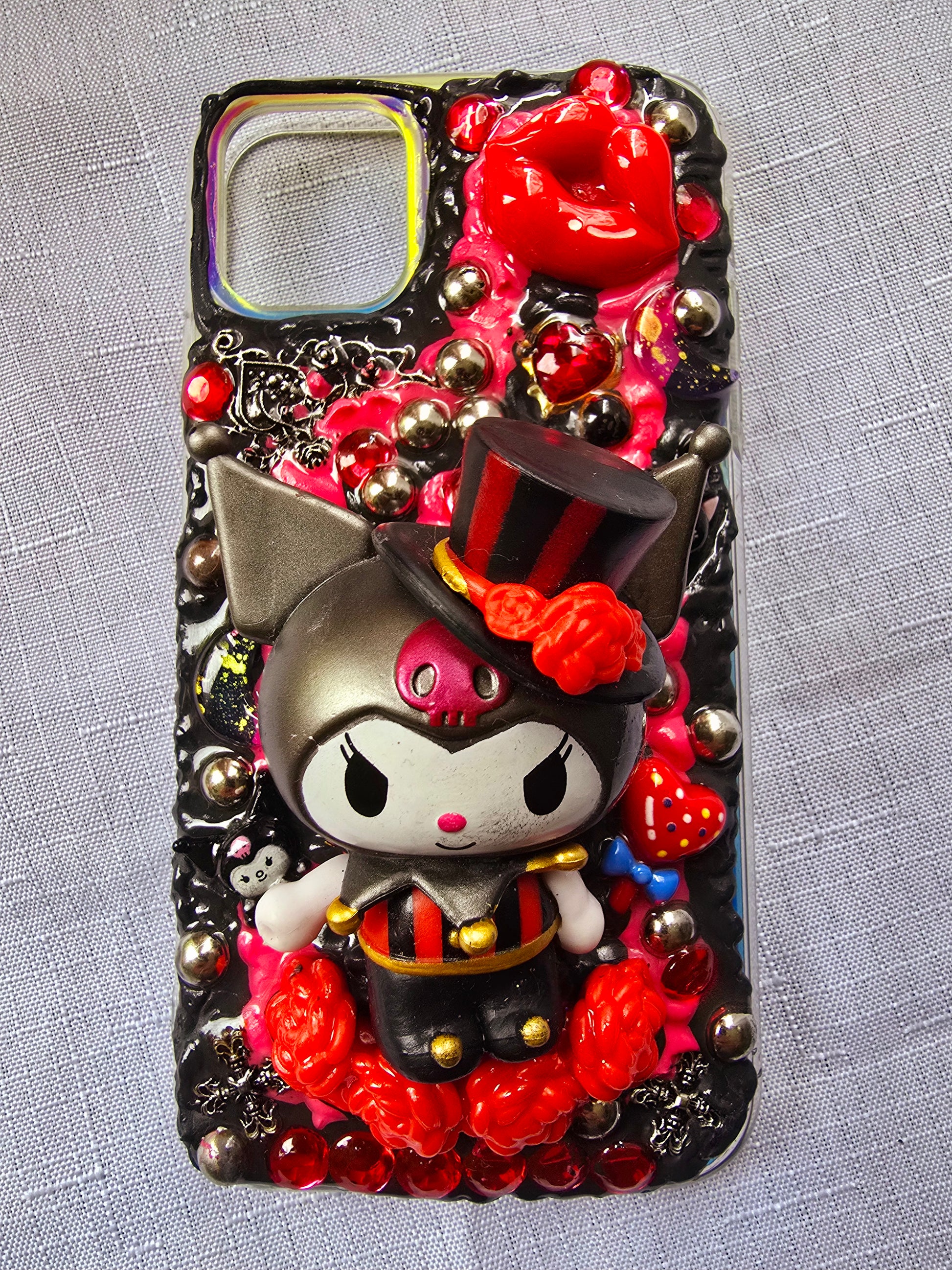 Handmade iPhone 11 phone case inspired by Kuromi in red and black colors – cute, edgy, and perfect for Sanrio fans.