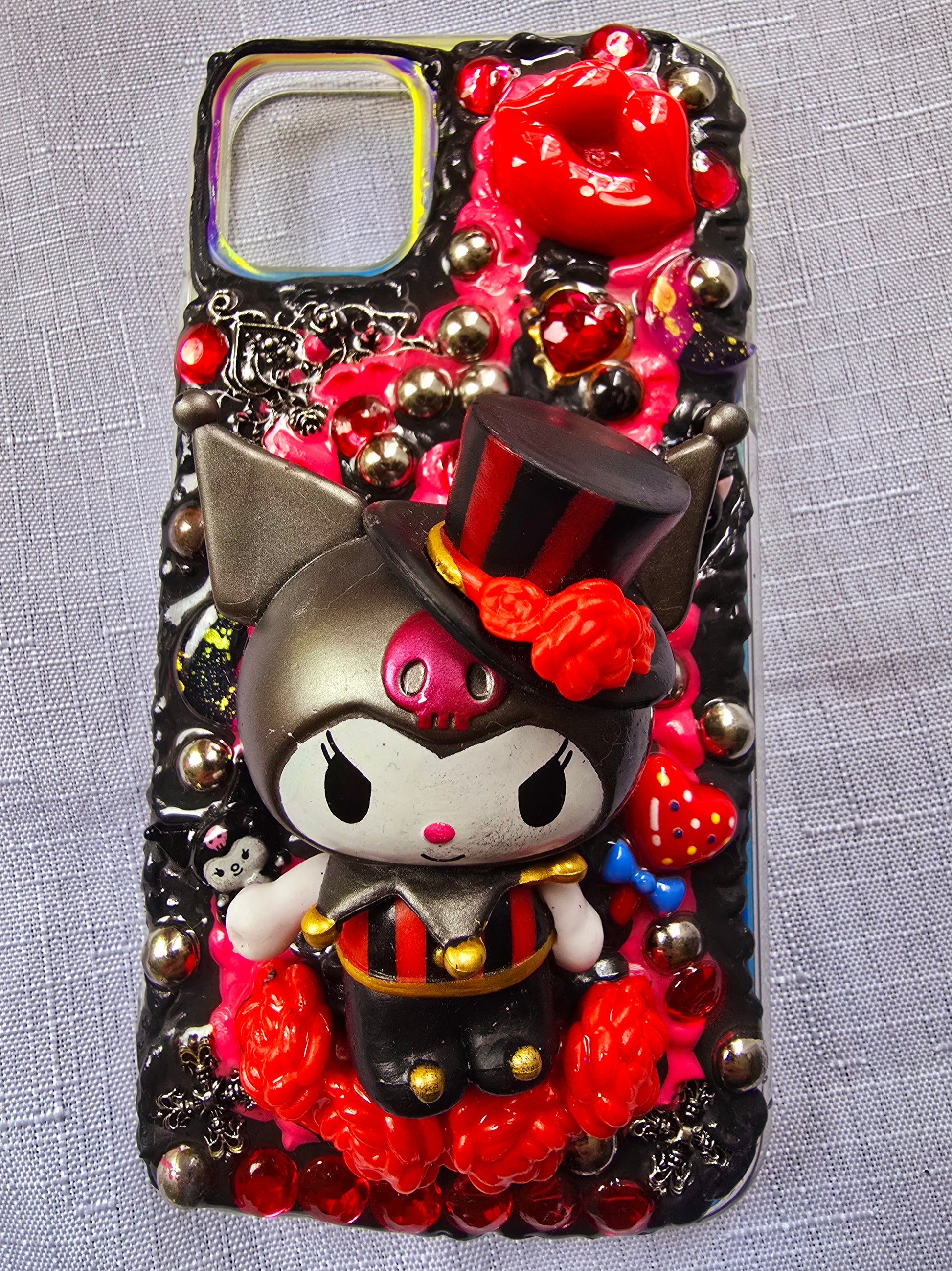 Handmade iPhone 11 phone case inspired by Kuromi in red and black colors – cute, edgy, and perfect for Sanrio fans.